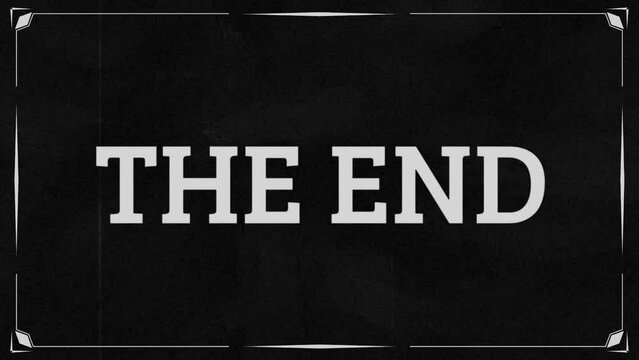 The End - retro text animation. Recreated frame from a silent film era with text in the header - The End. Vintage frame, damage, scratches, flickering, and retro effect.