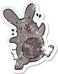 distressed sticker of a cartoon rabbit