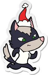 friendly hand drawn sticker cartoon of a wolf wearing santa hat
