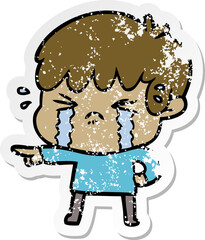 distressed sticker of a cartoon boy crying