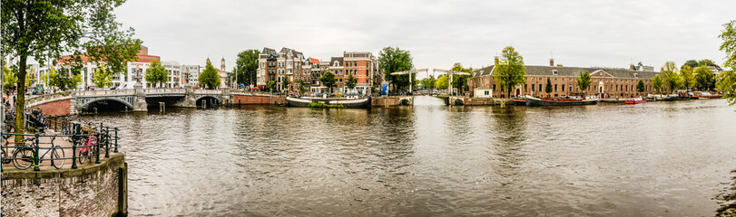 Fototapeta na wymiar Panorama of the Amstel river, Amsterdam