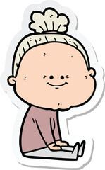 sticker of a cartoon happy old woman