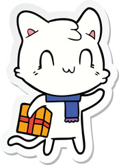 sticker of a cartoon happy cat wearing scarf