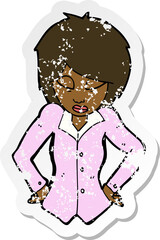 retro distressed sticker of a cartoon woman with hands on hips