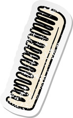 distressed sticker of a cartoon comb