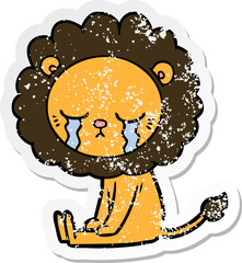 distressed sticker of a crying cartoon lion