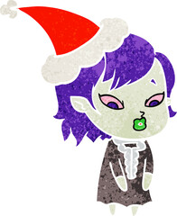 cute hand drawn retro cartoon of a vampire girl wearing santa hat