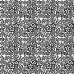  Floral pattern in black and white colors.