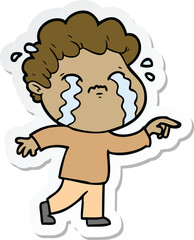 sticker of a cartoon man crying