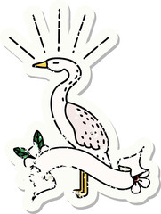 worn old sticker of a tattoo style standing stork