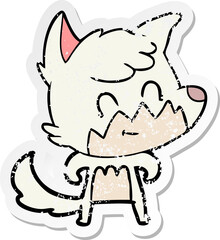 distressed sticker of a cartoon friendly fox