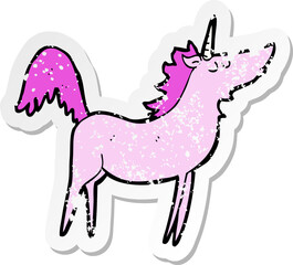 retro distressed sticker of a cartoon unicorn