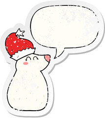cartoon bear wearing christmas hat with speech bubble distressed distressed old sticker