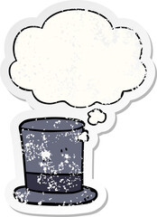 cartoon top hat with thought bubble as a distressed worn sticker