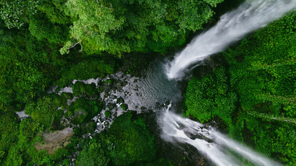 Aerial view of Sekumpul waterfall on Bali island Indonesia - travel and nature background. Drone photo