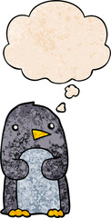 cartoon penguin with thought bubble in grunge texture style