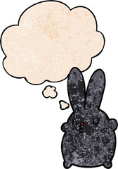 cute cartoon rabbit with thought bubble in grunge texture style