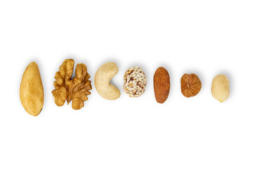 Assorted nuts lying in a row. Isolated on transparent background.