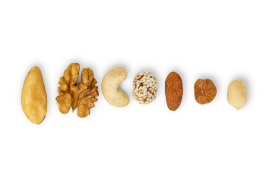 Assorted nuts lying in a row. Isolated on transparent background.