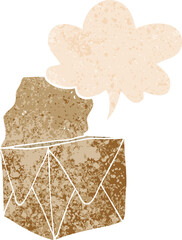 cartoon package with speech bubble in grunge distressed retro textured style