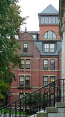 The beautiful campus autumn view with the colorful trees and leaves in the rainy day