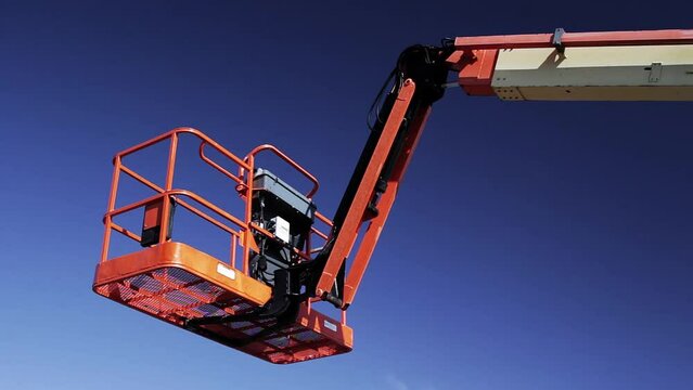 Industrial boom lift and sky