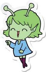 sticker of a cartoon alien girl laughing