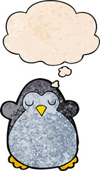 cartoon penguin with thought bubble in grunge texture style