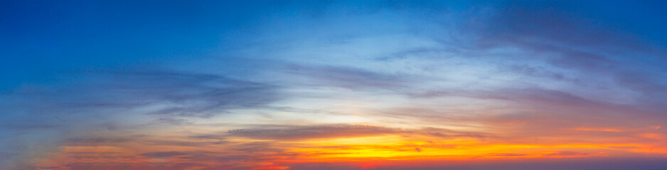Morning clouds and sky,Real majestic sunrise sundown sky background with gentle colorful clouds without birds. Panoramic, big size