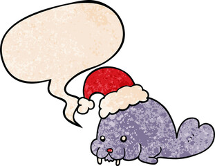 cartoon christmas walrus with speech bubble in retro texture style