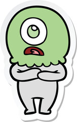 sticker of a cartoon cyclops alien spaceman