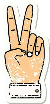 grunge sticker of a peace symbol two finger hand gesture