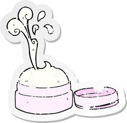 retro distressed sticker of a cartoon face cream