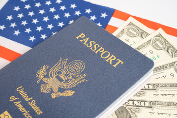 US passport issued to citizen and national of the United States of America to travel in most countries outside with USA flag and dollar money.