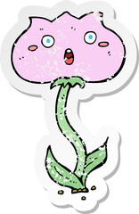 retro distressed sticker of a cartoon shocked flower