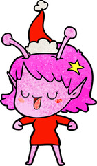happy alien girl hand drawn textured cartoon of a wearing santa hat