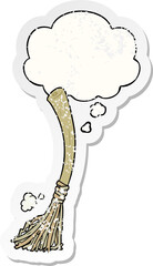 cartoon magic broom with thought bubble as a distressed worn sticker