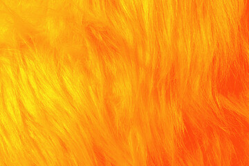 Orange fur texture. orange sheepskin background. texture of pink shaggy fur. Wool texture.