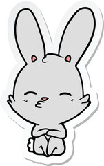 sticker of a curious bunny cartoon