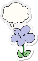 cartoon flower with thought bubble as a printed sticker