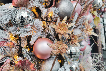 Gold, silver and pink christmas decorations close up