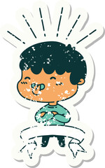 worn old sticker of a tattoo style boy sticking out tongue