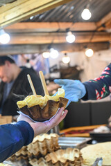 Alimentation aux Plaisirs d'hiver a Bruxelles tartiflette repas chaud commerce foire