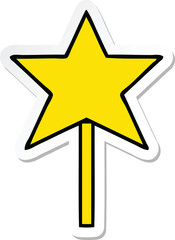 sticker of a cute cartoon star wand