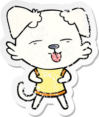 distressed sticker of a cartoon dog sticking out tongue