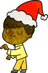 hand drawn textured cartoon of a grumpy boy wearing santa hat