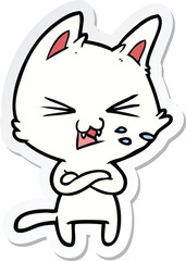 sticker of a cartoon cat with crossed arms