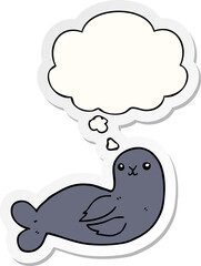 cartoon seal with thought bubble as a printed sticker