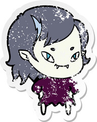 distressed sticker of a cartoon friendly vampire girl