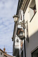Fototapeta na wymiar Narrow cobblestone streets and whitewashed facades of Ronda city